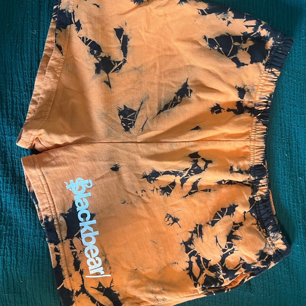 EXCLUSIVE COLLECTABLE    Orange and Black Athletic Shorts with Distressed Design